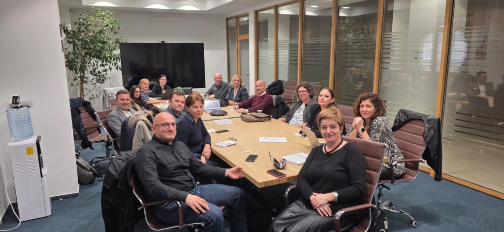 Modern office conference room with professionals working together.