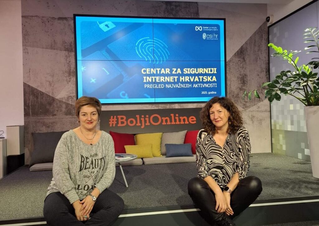 Women participating in Safer Internet services discussion at Impetus event.