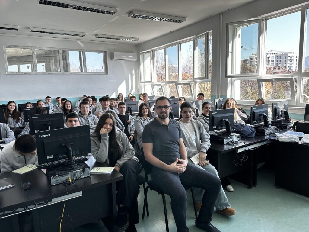 Group of students participating in a cybersecurity training session in Kosovo.