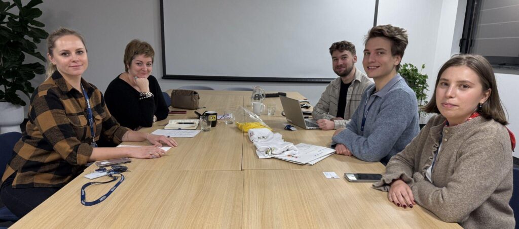 Impetus team members during a meeting at NASK visit.