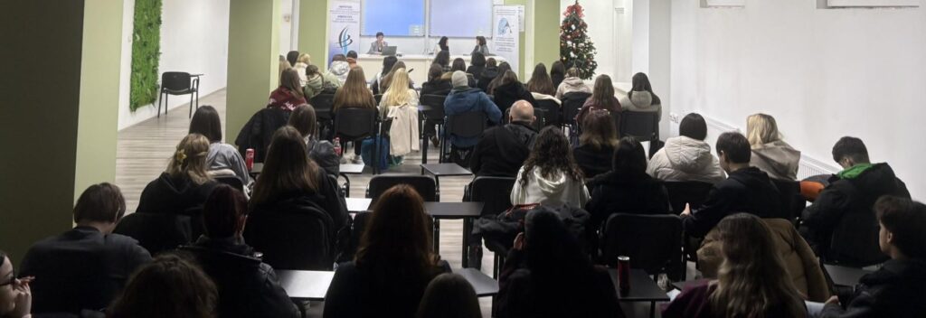 Audience attending a Data Protection Day seminar in a modern conference room.