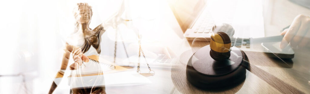 Gavel and scales of justice on a desk symbolizing judicial transparency.
