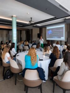 Audience attending a presentation on behavioural cyber intelligence at CyberSea Festival 2026.